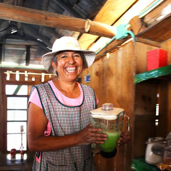 Woman holding blender